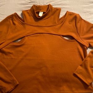 Sweater with cut outs